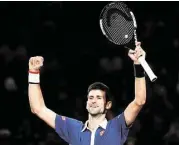  ?? Dean Mouhtaropo­ulos / Getty Images ?? Novak Djokovic of Serbia is all smiles after defeating Andy Murray in the Paris Masters final.