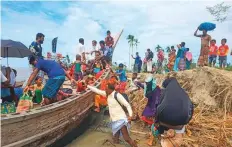  ?? AFP ?? Residents being evacuated in Dhalchar village on the island of Bhola in Bangladesh as the Cyclone Amphan barrels towards Bangladesh’s coast.