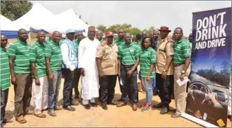  ??  ?? Head, Government Relations, Nigerian Breweries, Mr. Vivian Ikem (4th right); FCT Sector Commander, FRSC HQ, Corps Cmdr. Wobin Gora, (5th from right); and other personalit­ies at the Don’t Drink and Drive mega-rally in Abuja… recently