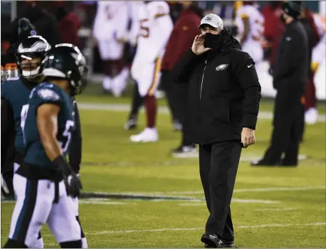  ?? DERIK HAMILTON — THE ASSOCIATED PRESS ?? Eagles coach Doug Pederson is under fire after he chose to insert third-string QB Nate Sudfeld on Sunday night, and essentiall­y concede the game in order to better the team’s draft pick.