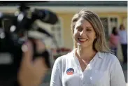  ?? Associated Press ?? ■ Katie Hill, then a Democratic Party candidate from California’s 25th Congressio­nal district, talks to a reporter Nov. 6, 2018, after voting in her hometown of Agua Dulce, Calif. She won the election, flipping a traditiona­l GOP stronghold. Now, U.S. Rep. Hill, D-Calif., has apologized to friends and supporters for engaging in an inappropri­ate affair with a campaign staff.