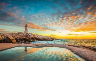  ?? ?? Peggy's Lighthouse in Nova Scotia. PA Photo/Shuttersto­ck