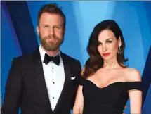  ?? Associated Press file photo ?? In this Nov. 8, 2017 file photo, Dierks Bentley, left, and his wife Cassidy Black arrive at the 51st annual CMA Awards in Nashville, Tenn.