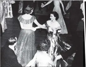  ??  ?? CAREFREE FUN: Elizabeth laughs as she joins Lady Pamela in an eightsome reel at a military dance in Malta. Right: The Princess’s delight is clear as she arrives in Malta in 1949 to be reunited with Philip. Top left: Lady Pamela last week