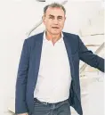  ?? ?? LIVE IT UP WHILE YOU CAN: Nouriel Roubini at the downtown triplex apartment famous for his hot-tub parties with models.