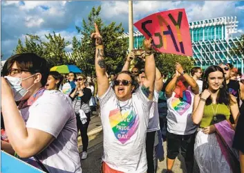  ?? A “SAY GAY Chandan Khanna AFP/Getty Images ?? Anyway” rally in Miami Beach, Fla. The Human Rights Campaign, NAACP and other groups are warning people of color, immigrants and LGBTQ+ travelers that Florida’s new laws may endanger them.