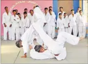  ?? HT PHOTO ?? Street kids displaying their judo skills at UP Judo Associatio­n’s newly launched centre for them in Lucknow on Saturday.