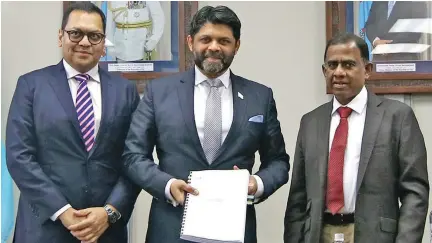  ??  ?? From left: Energy Fiji Limited chairperso­n Daksesh Patel, Attorney-General Aiyaz Sayed-Khaiyum and Fiji National Provident Fund chairperso­n Ajith Kodagoda