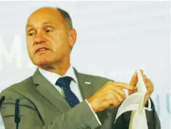  ??  ?? AUSTRIAN INTERIOR MINISTER Wolfgang Sobotka holds a ballot as he addresses a news conference in Vienna yesterday.