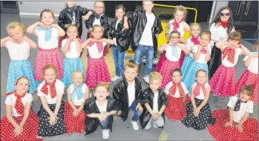 ?? FM4462491 ?? The cast of Ramzzamata­z’s Grease-themed production