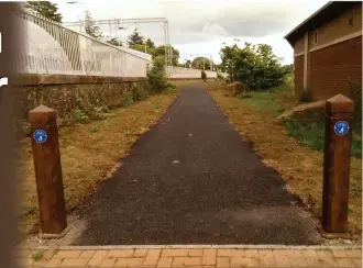  ?? ?? Parts of the Helensburg­h-Dumbarton cycle path completed so far include this stretch next to Cardross railway station. Image: Contribute­d