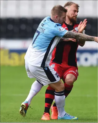  ??  ?? Richard Tait jostles with Michael Gardyne of County