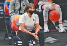  ?? AP PHOTO/ERIC GAY ?? Stanford women’s basketball coach Tara VanDerveer watches as her Cardinal take on South Carolina in the Final Four on Friday night at the Alamodome in San Antonio. Stanford won 66-65 to reach the title game for the first time since 2010, and the Cardinal will take on fellow Pac-12 program Arizona, a first-time finalist, on Sunday night for the national championsh­ip.