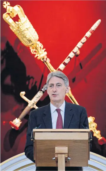  ?? Picture: PA ?? Chancellor Philip Hammond delivering his Mansion House speech in the City yesterday