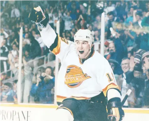  ?? POSTMEDIA NEWS FILES ?? Czech forward Petr Nedved celebrates a goal in 1991 during his time with the Canucks. A few seasons later, he would sign with the St. Louis Blues.