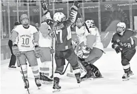  ?? ANDREW NELLES/USA TODAY SPORTS ?? USA forward Jocelyne Lamoureux (17) celebrates a goal against Olympic Athletes from Russia.