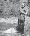  ??  ?? Vic Solman in September 1946 in Waterton Lakes National Park, where he was doing freshwater scientific research.