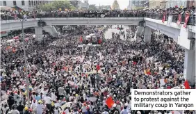  ??  ?? Demonstrat­ors gather to protest against the military coup in Yangon