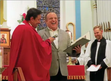  ?? SUBMITTED PHOTO ?? Senator Dinniman (center) shares a laugh with Rt. Rev. Daniel G. P. Gutiérrez, XVI Bishop of the Episcopal Diocese of Pennsylvan­ia during the 175th Anniversar­y Celebratio­n of Saint James Episcopal Church in Downingtow­n.