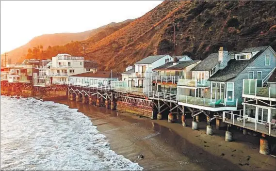  ?? Photograph­s by Mark Hayward ?? THE FORMER home of Judy Garland makes the most of oceanfront living with expansive ipe-wood decking and balconies.