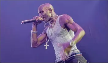  ?? Emon Hassan / New York Times ?? Earl Simmons, the rapper known as DMX, performs at the Barlcays Center in Brooklyn in 2014. Simmons died on Friday in White Plains. He was 50.