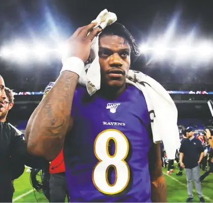  ?? MADDIE Meyer/getty IMAGES ?? The Ravens used the nonexclusi­ve franchise tag on quarterbac­k Lamar Jackson, who can negotiate with other teams as a free agent.