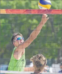  ?? JASON MALLOY/THE GUARDIAN ?? Tynan Murphy prepares to return the ball during beach volleyball action Sunday at the Canada Games in Winnipeg.