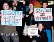  ??  ?? PROTEST: Cardiff University students attempting to stop a speech by veteran feminist Germaine Greer