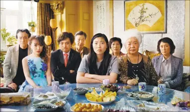 ?? Associated Press ?? Awkwafina, center, in a scene from “The Farewell.”