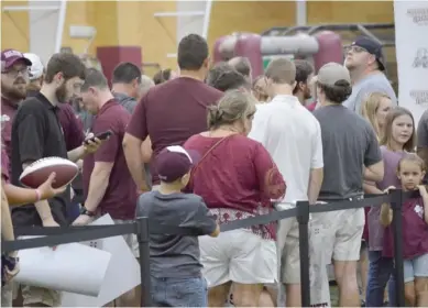  ?? (Photo by Jason Cleveland, SDN file) ?? Long lines are expected when Mississipp­i State’s Fan Day for football, soccer, volleyball and golf takes place Saturday inside the Palmeiro Center.