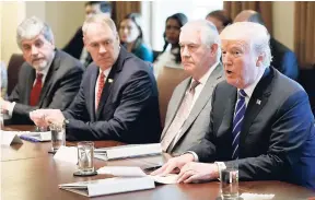  ?? AP ?? President Donald Trump announces that the United States will designate North Korea a state sponsor of terrorism during a cabinet meeting at the White House, yesterday, in Washington. From left: Acting Secretary of Health and Human Services Eric Hargan,...