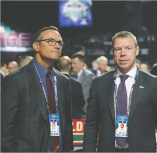  ?? GETTY IMAGES/FILES ?? Red Wings general manager Steve Yzerman, left, with director of amateur scouting Kris Draper at the 2019 NHL entry draft in Vancouver, has said publicly that he’s not in favour of the league holding the 2020 draft in June, before the season ends.