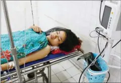  ?? PHA LINA ?? Khy Srey Moa, 23, one of seven victims rushed to Preah Kossamak Hospital after she was injured in an explosion at a Chinese-owned factory on Wednesday in Phnom Penh’s Sen Sok district.