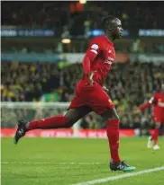  ??  ?? Liverpool’s Sadio Mane celebrates scoring against Norwich in the Premier League yesterday.