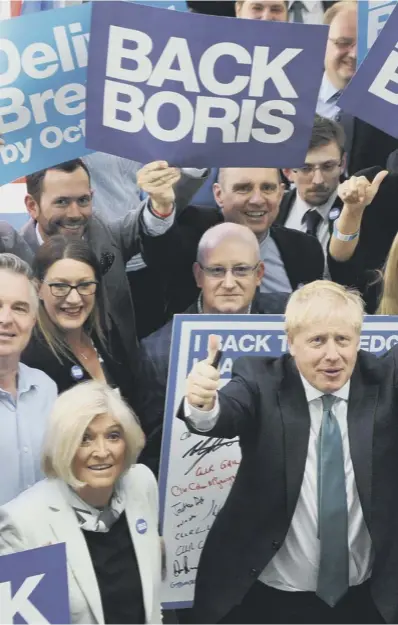  ??  ?? 0 Tory leadership frontrunne­r Boris Johnson with some of his supporters at the Perth hustings event on