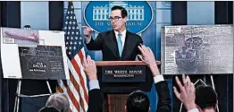  ?? ALEX WONG/GETTY ?? Treasury Secretary Steven Mnuchin talks about new U.S. sanctions against North Korea.