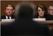  ??  ?? Senate Judiciary Committee chairman Sen. Lindsey Graham, R-SC, and ranking member Sen. Dianne Feinstein, D-Calif., listen to Barr testify.