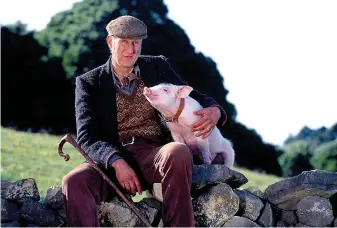  ?? Submitted photo ?? ■ A perfect example of family fare for the holiday season, “Babe” features a lovable pig named Babe and farmer Arthur Hoggett (James Cromwell). Babe (voiced by by Christine Cavanaugh) must adjust to life on the farm and its residents, including a border collie named Fly.