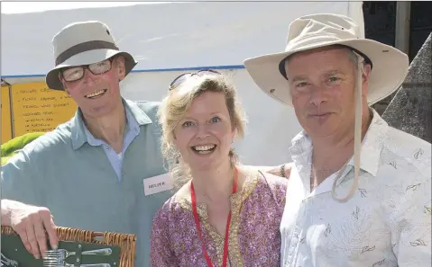  ??  ?? Martin Davidson, Sallyanne Fisher and Ed O’Donovan selling the raffle tickets at the Christ Church Parish Fete.