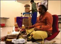  ?? Submitted photo ?? A Hindu priest conducts a prayer ceremony at the Boston Sri Kalikambal Shiva Temple on North Main Street in Bellingham.