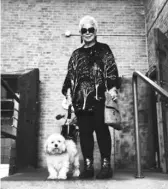  ?? ALDEN KNIGHT ?? Susann Craig — dressed for a walk with her dog Dooley — outside her Logan Square loft.