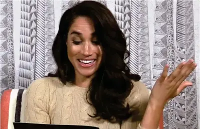  ??  ?? Stumped: A laughing Meghan Markle takes the tongue-in-cheek quiz for TV channel Dave