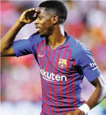  ?? Ousmane Dembele celebrates after scoring for Barcelona ??