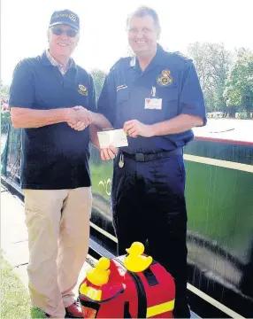  ??  ?? Shepshed Charnwood Rotarian, Fred Thompson (left) hands over the cheque to Graham Whitehead, chair of the South Notts Community First Responders.