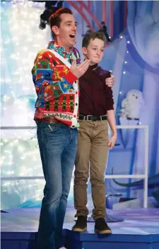  ?? Photos by Andres Poveda/courtesy of RTÉ Press Office. ?? 12-year-old Denis Moroney from Killorglin withToy Show host Ryan Tubridy on Friday night after Denis’ amazing performanc­e of the song ‘Grace’.