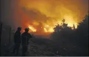  ?? (Photo AFP) ?? Quelque  sapeurs-pompiers et  engins luttaient hier soir contre deux incendies en Haute-Corse.