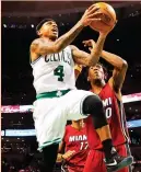  ?? (Reuters) ?? BOSTON CELTICS guard Isaiah Thomas scored 30 points, including 20 in the second half, as the Celtics beat the Miami Heat 112-108 on Sunday night for their fourth straight victory to move even with the Cleveland Cavaliers atop the Eastern Conference.