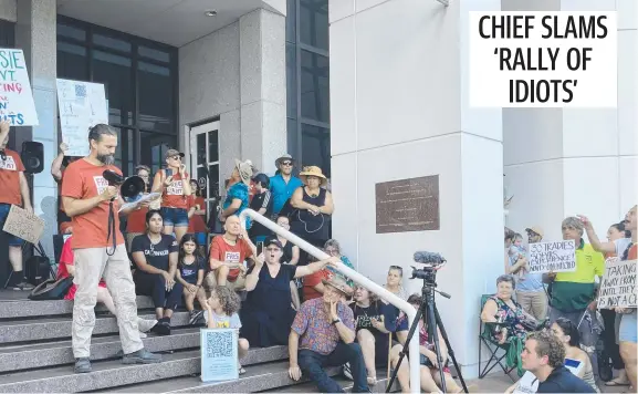  ?? ?? Protesters attending a Freedom Rally marched from the Darwin Esplanade to parliament. Picture: Thomas Morgan