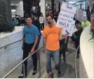  ?? BILL SAWCHUK THE ST. CATHARINES STANDARD ?? Men take part in the Walk A Mile In Her Shoes event at The Pen Centre Saturday.