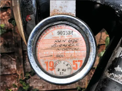  ??  ?? ABOVE: 1957, the year Myrry bought his Norton – and the year of the tax disc he kept that inspired him to find it and own it again